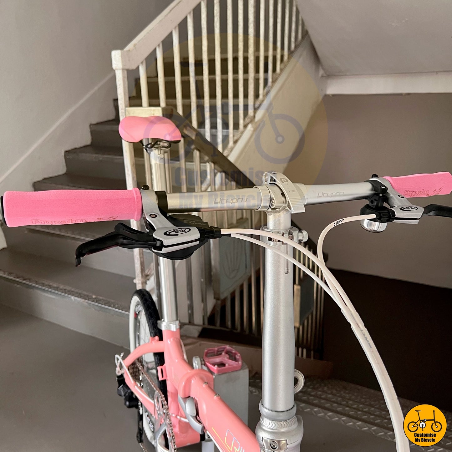 Pink Handgrips on Affordable Crius Master 22-Inch Foldable Bike β A High-Quality Alternative to Liaoge