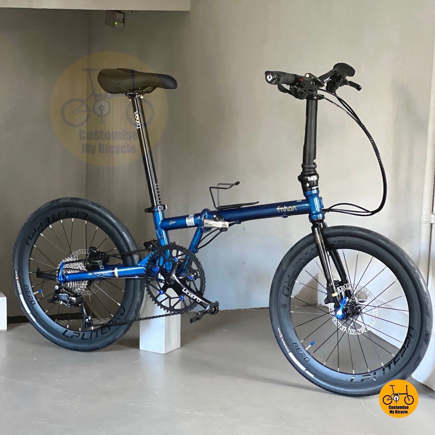 Compact Shimano-equipped foldable bike with custom components