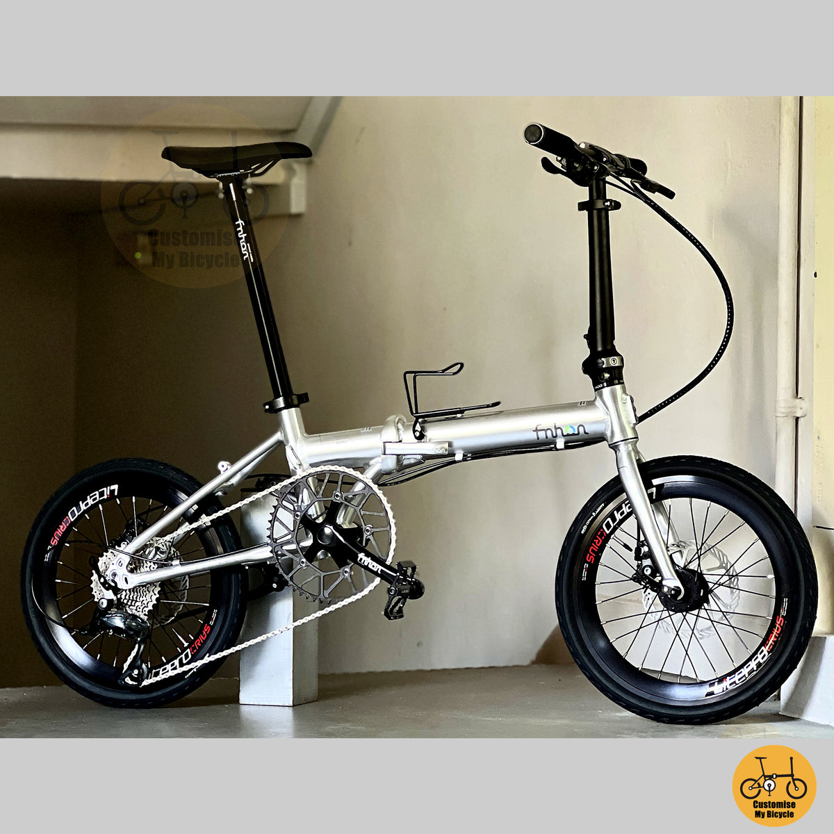 Fnhon Zephyr 16" Platinum Silver folding bike in compact folded configuration
