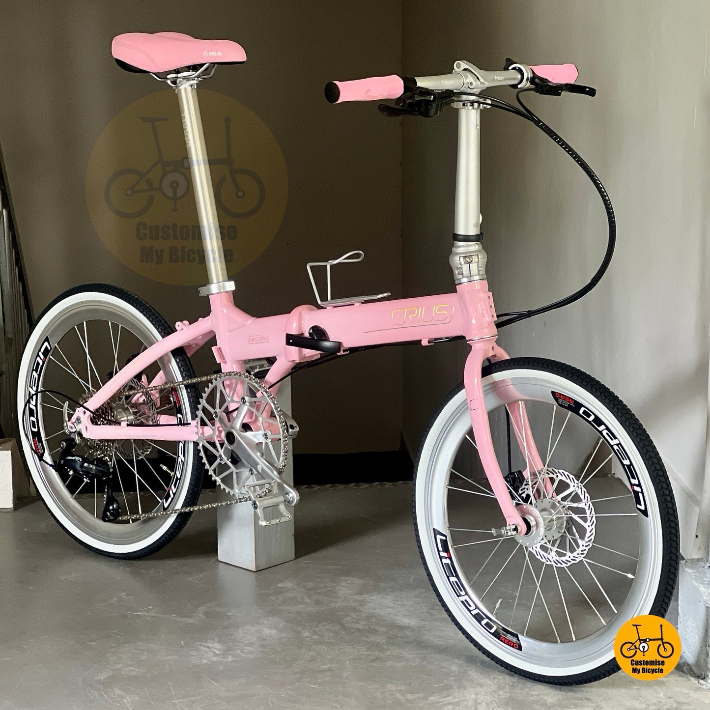 Crius Master 22 Inch Baby Pink Folding Bicycle With Shimano 9 Speed Drivetrain
