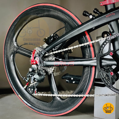 Deadpool-themed foldie with carbon wheels and Shimano 10 gears  
