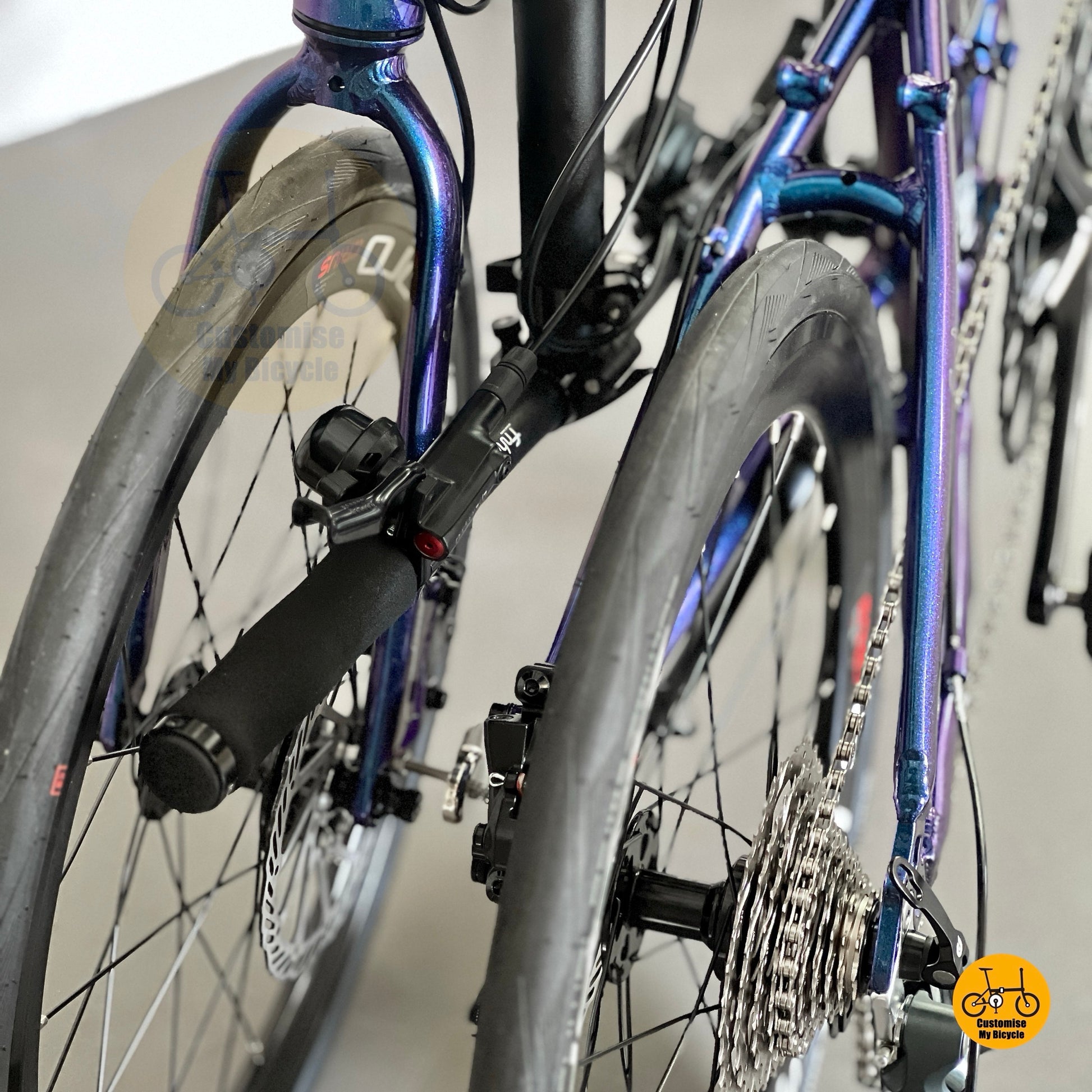 Detail shot of Schwalbe One fast tyres on Fnhon Blast 22 inch folding bike Chameleon Blue
