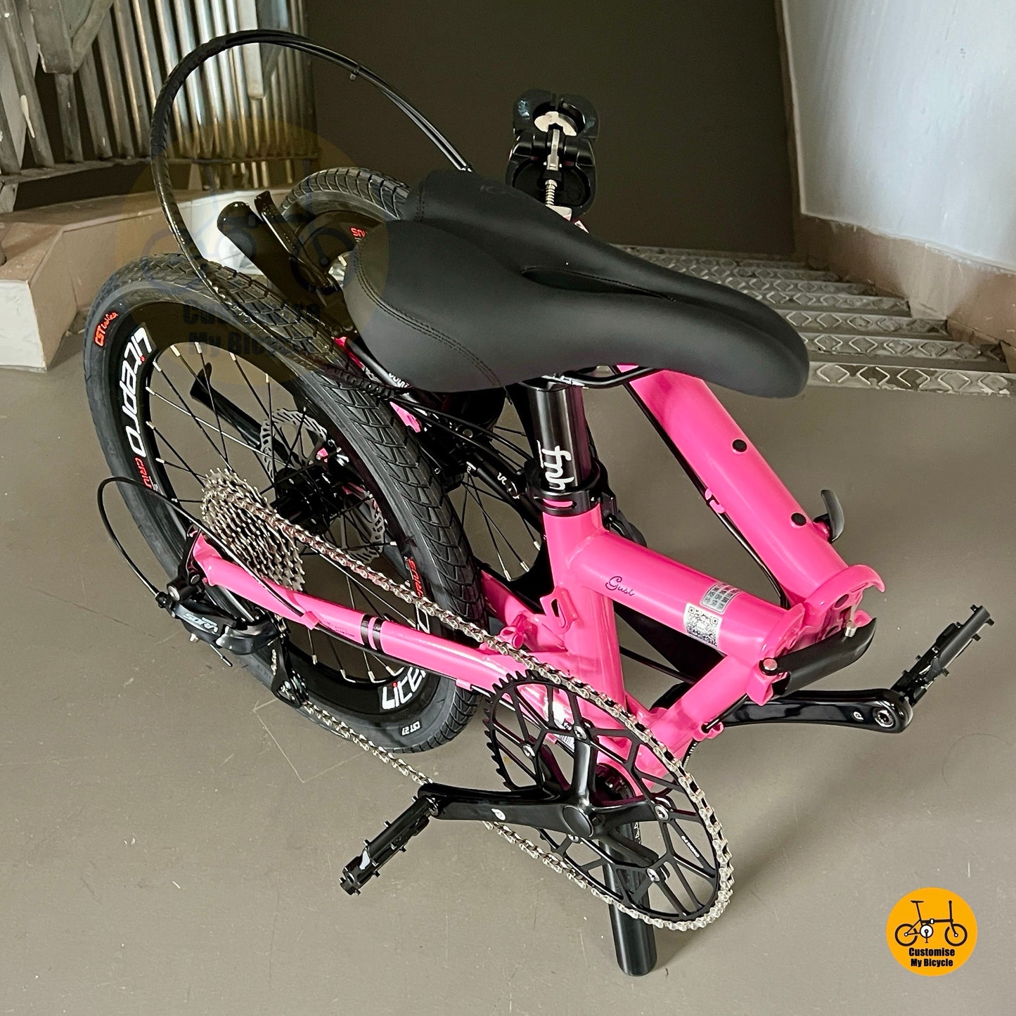 Compact folding design of Fnhon Gust 20 inch hot pink bicycle with Litepro parts
