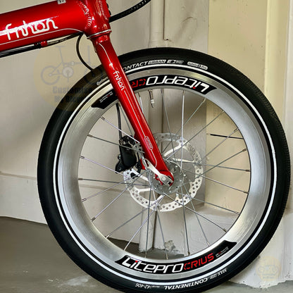 Fnhon Blast 20 inch folding bicycle close up of front wheel showing LITEPRO Aero high profile wheelset Continental Contact Urban fast rolling tyre and SHIMANO hydraulic disc brake