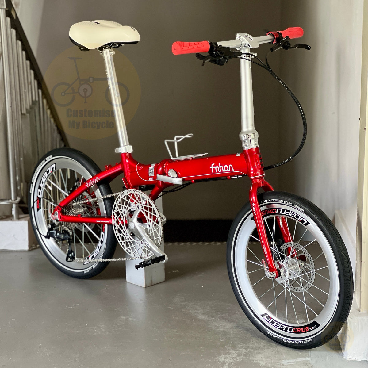 Fnhon Blast Ruby Red 20 inch folding bicycle overall front three quarter view with Shimano hydraulic disc brake Continental Contact Urban tyres and premium folding bike components