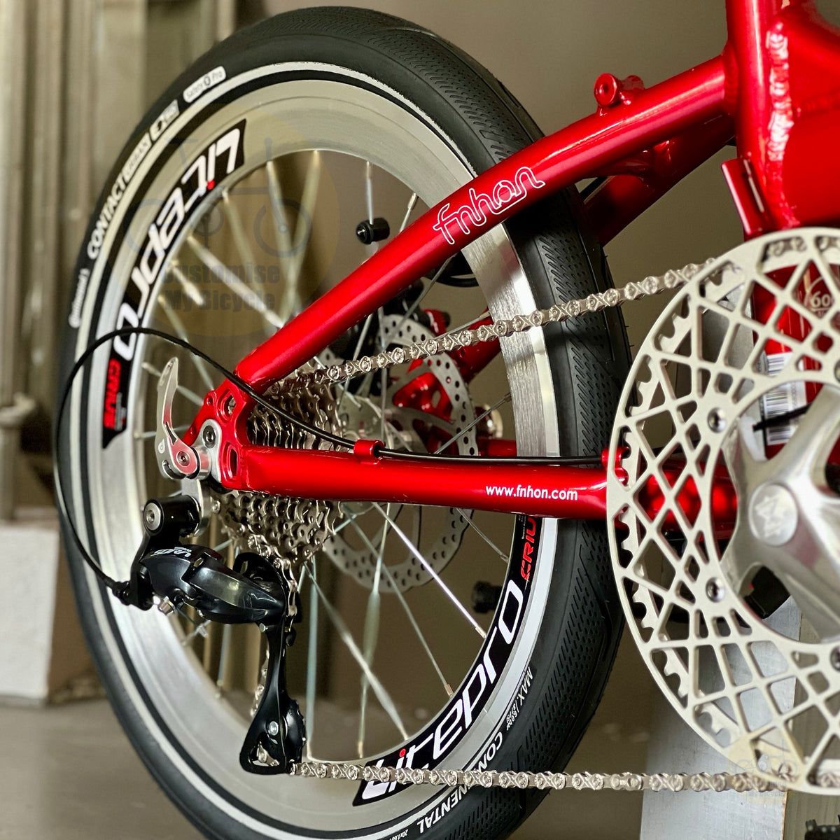 Fnhon Blast 20 inch folding bicycle close up of Shimano 9 gears shifting system rear derailleur cassette chain and drivetrain components