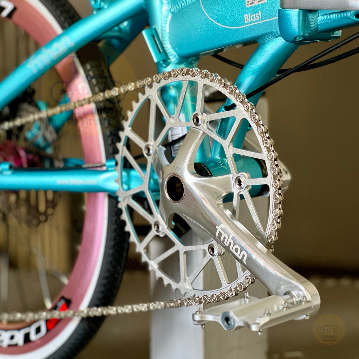 Close up FNHON 54T Hollowtech crankset on lightweight folding bicycle