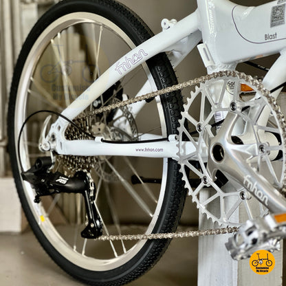 Rear derailleur view of white foldable bike with LTwoo 9s

