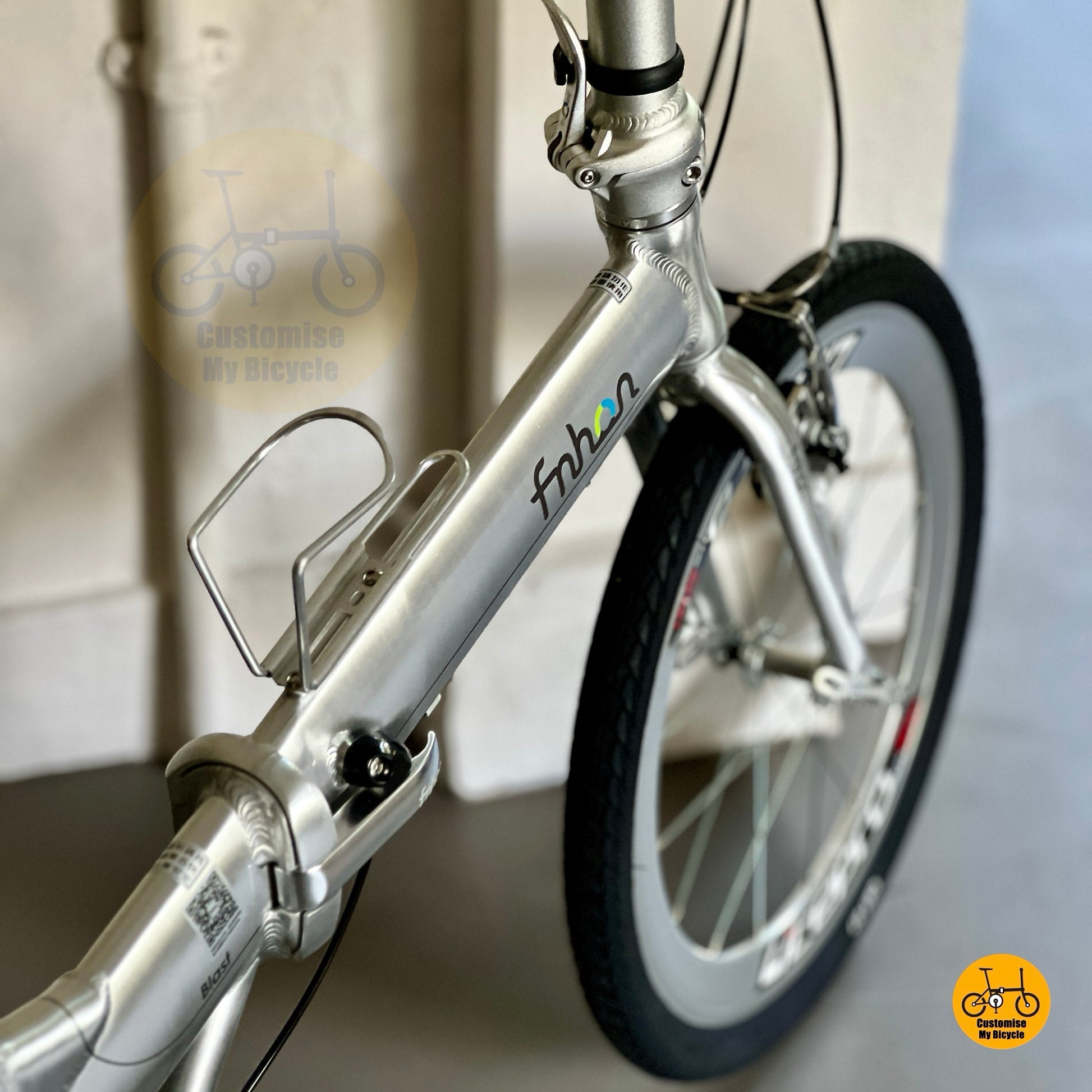 Detail shot of Fnhon Blast polished silver folding bike
