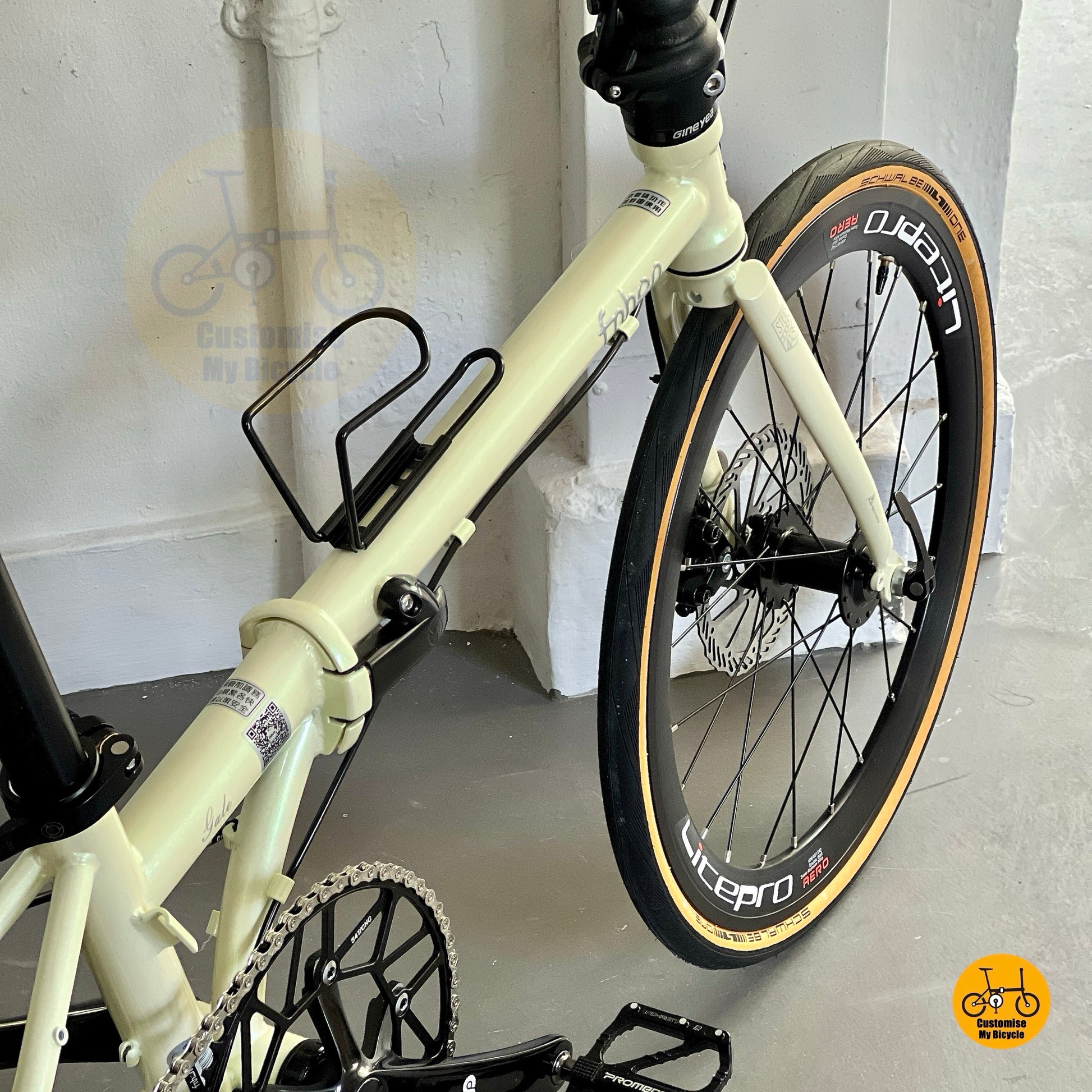 Front wheel close up of Litepro Aero high profile wheel with Schwalbe tan wall tyre
