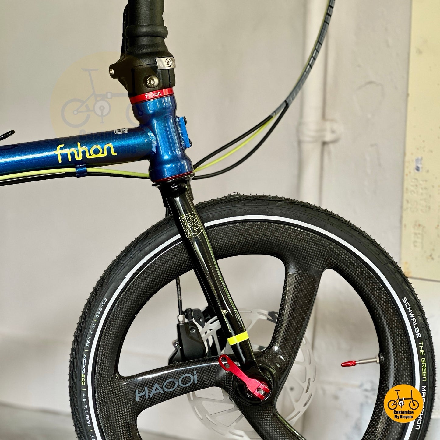 Fnhon Gust folding bike rear angle view with Schwalbe Marathon tyres compact folding bicycle
