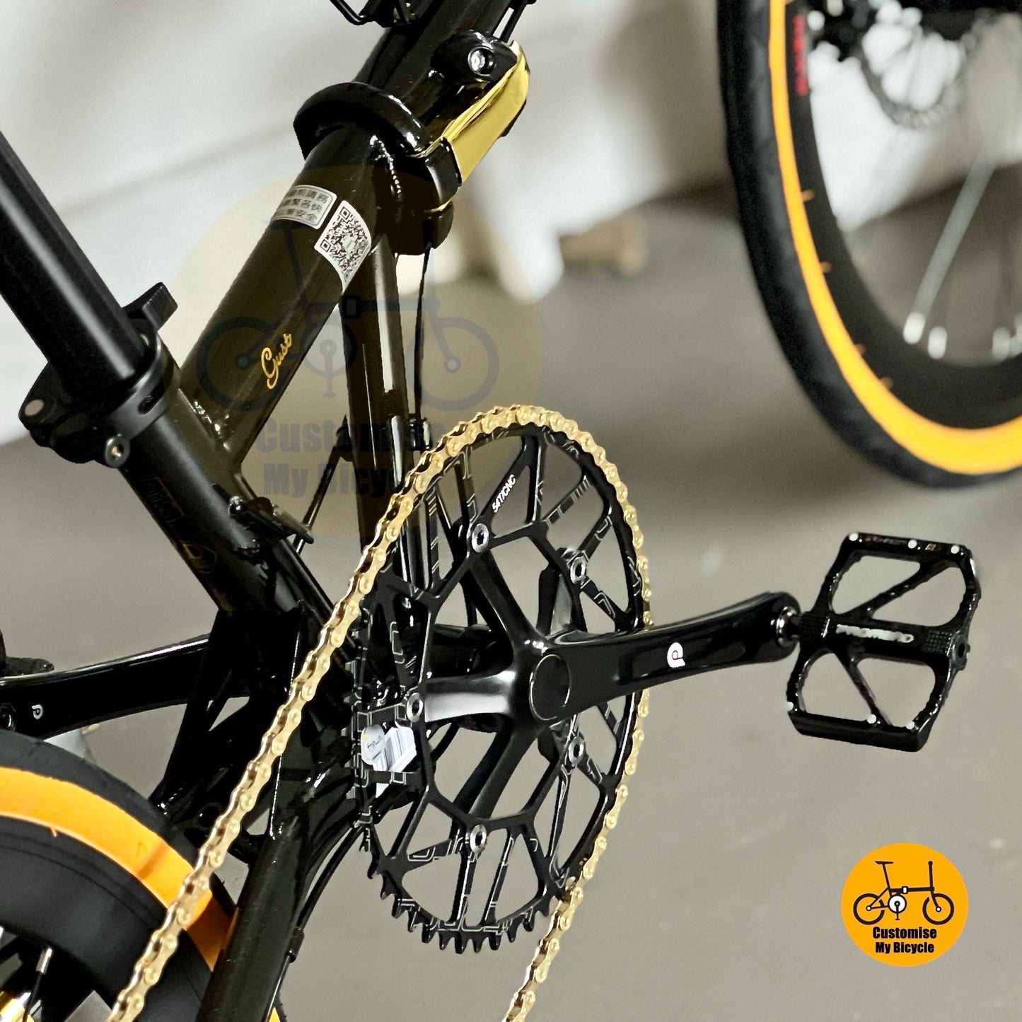 Close up of Promend R67 bearings pedals installed on folding bike
