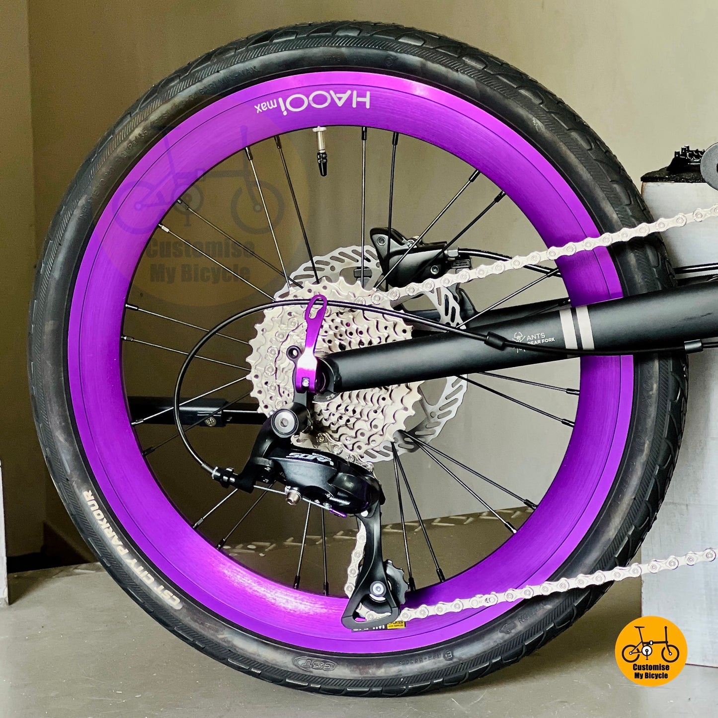 Matte Black folding bike with HAOOI Max high wall wheels and CST City tyres