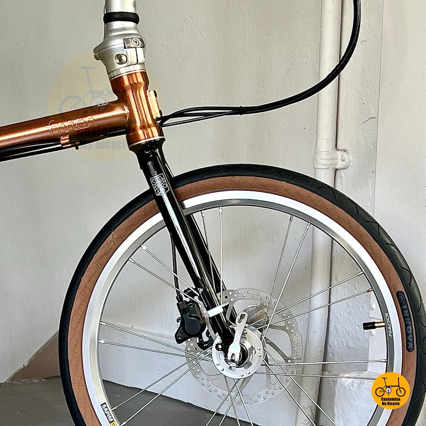 Front wheel close up with Litepro aero high profile rims and INNOVA tyres
