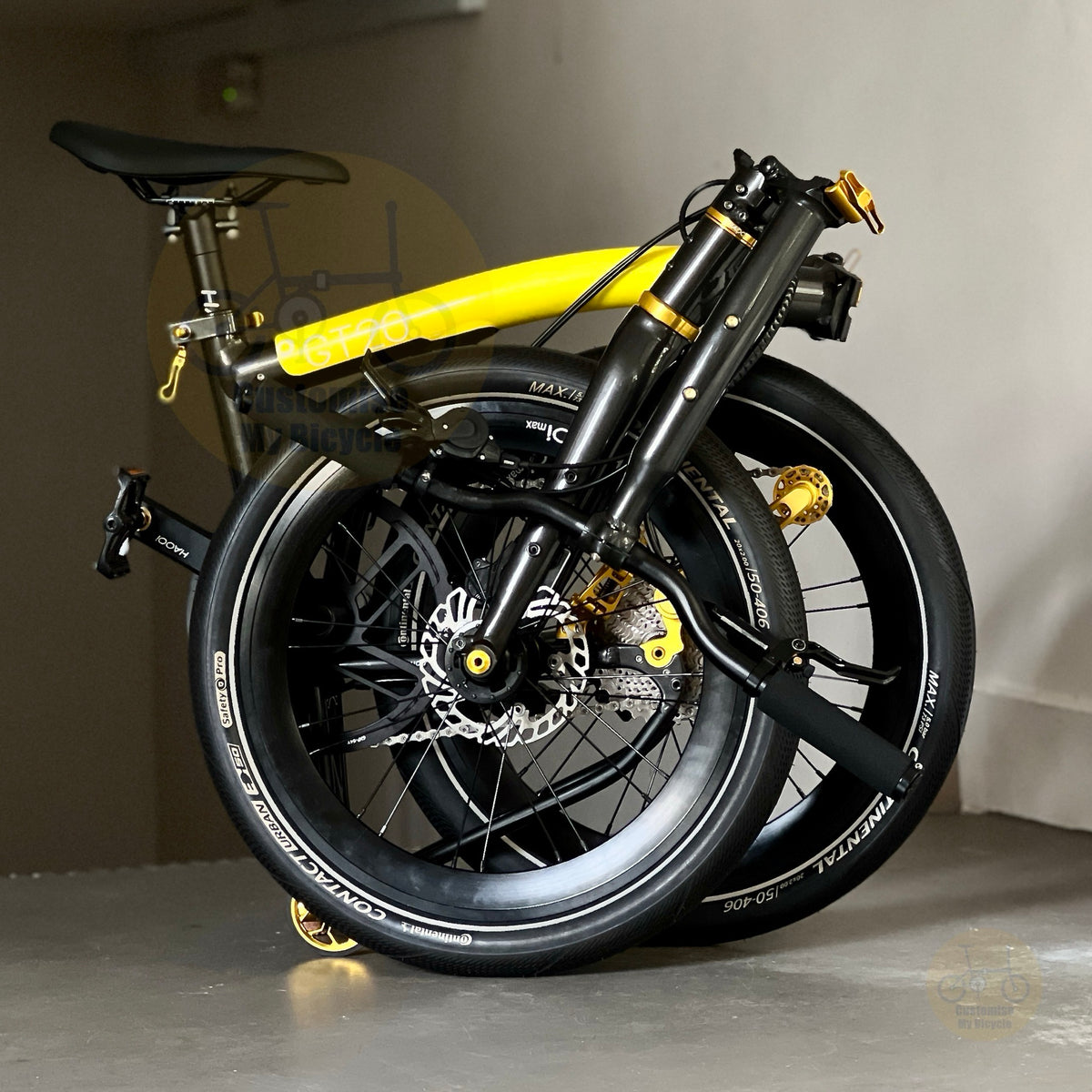 Fnhon GT20 Bumblebee 20 inch folding bicycle folded compactly showing the trifold design compact frame and easy transport configuration
