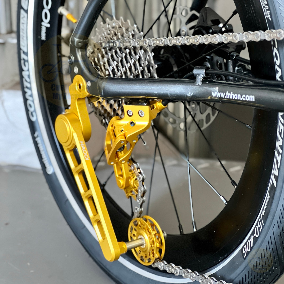 Fnhon GT20 Bumblebee folding bike close up of Shimano 10 speed rear drivetrain cassette derailleur chain and precision shifting components
