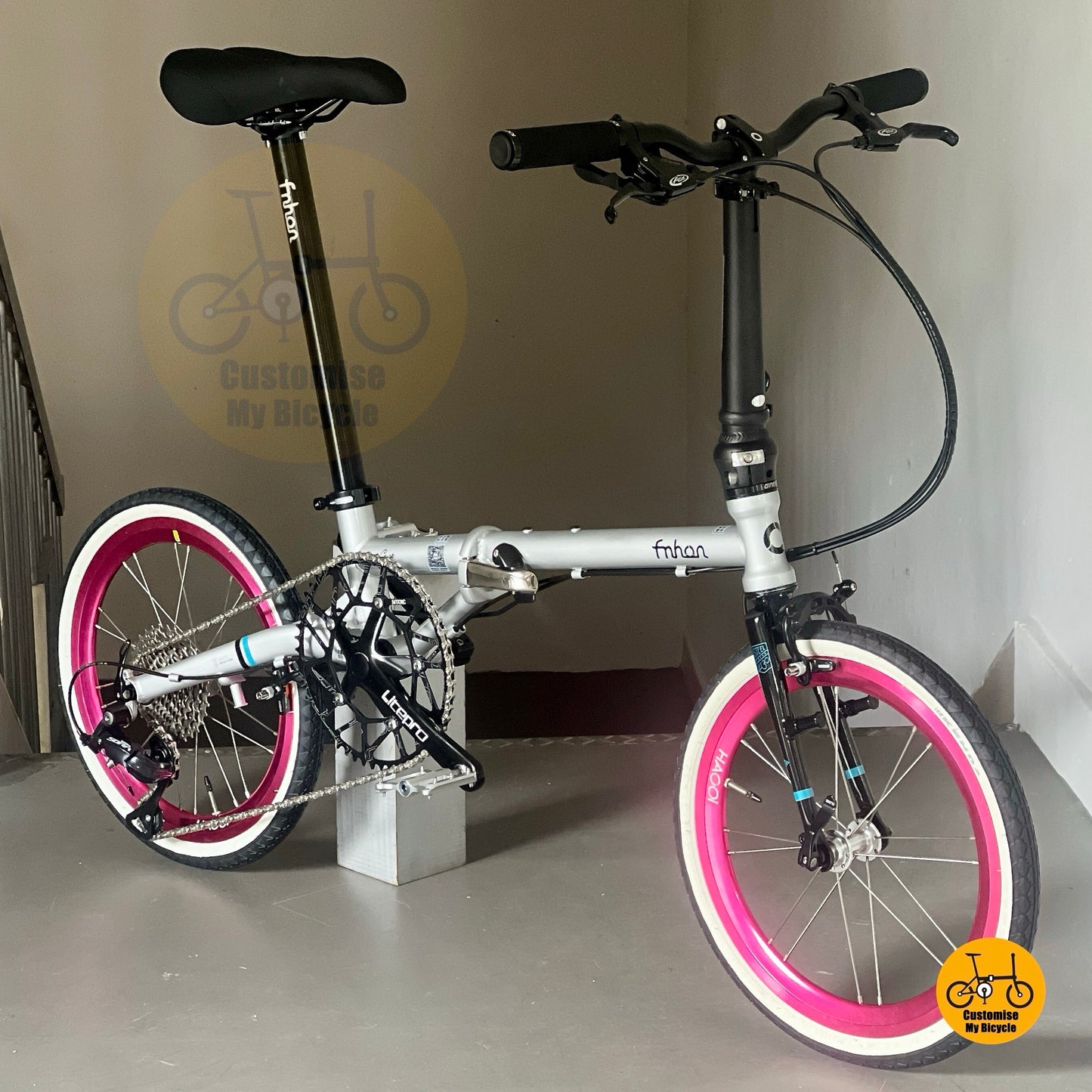 Sepeda Lipat Fnhon Gust 18 Inci Abu Abu Dolphin Rim Merah Muda Shimano 9 Kecepatan
