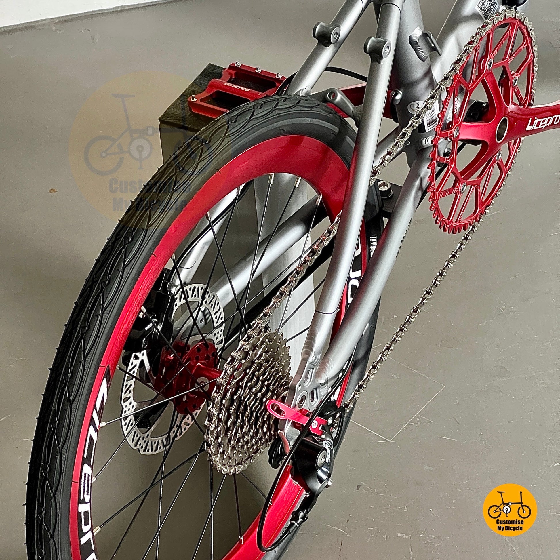 Customised folding bike with unique red Litepro components  
