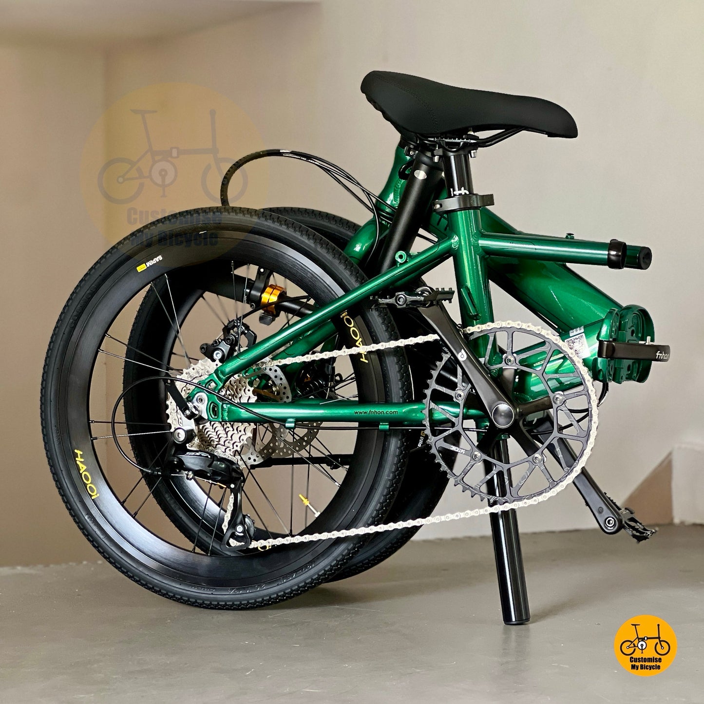 Detailed view of Fnhon adjustable handle post and seat post on Monsoon 22 inch folding bike