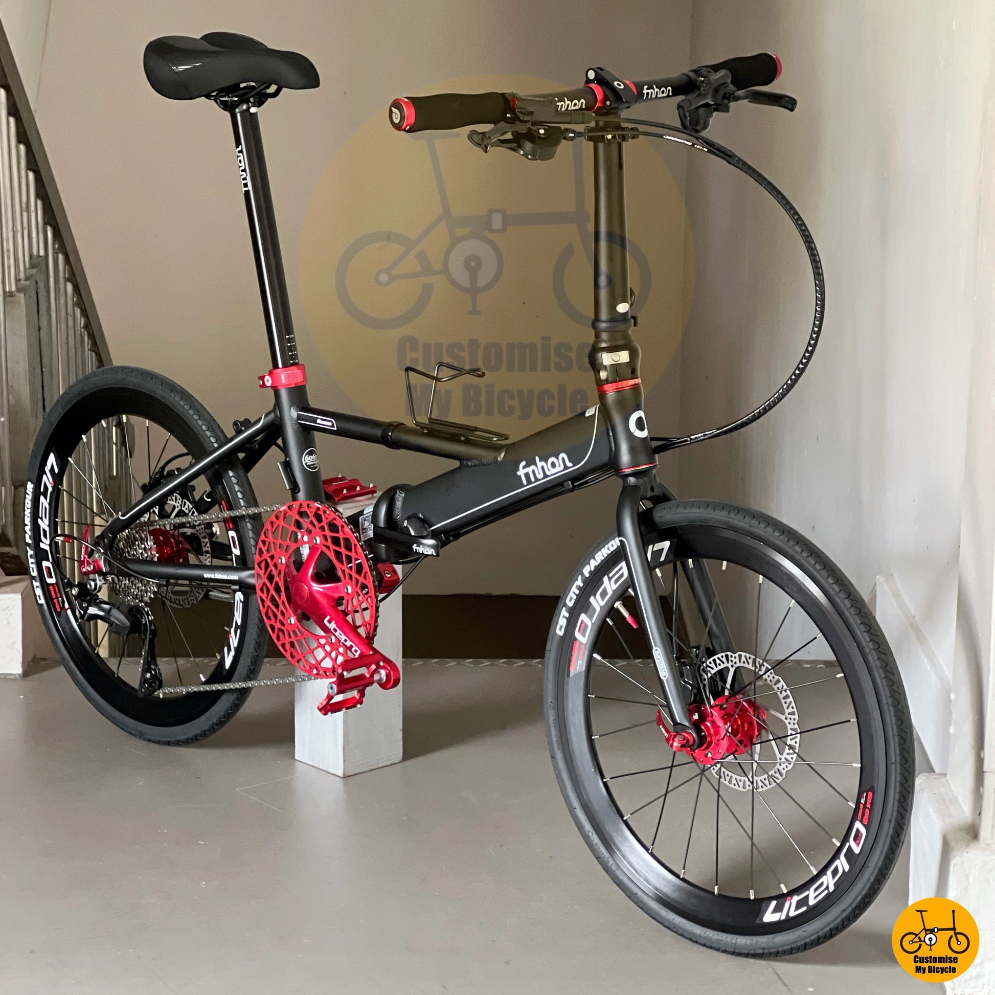 Folding bike matte black red accent

