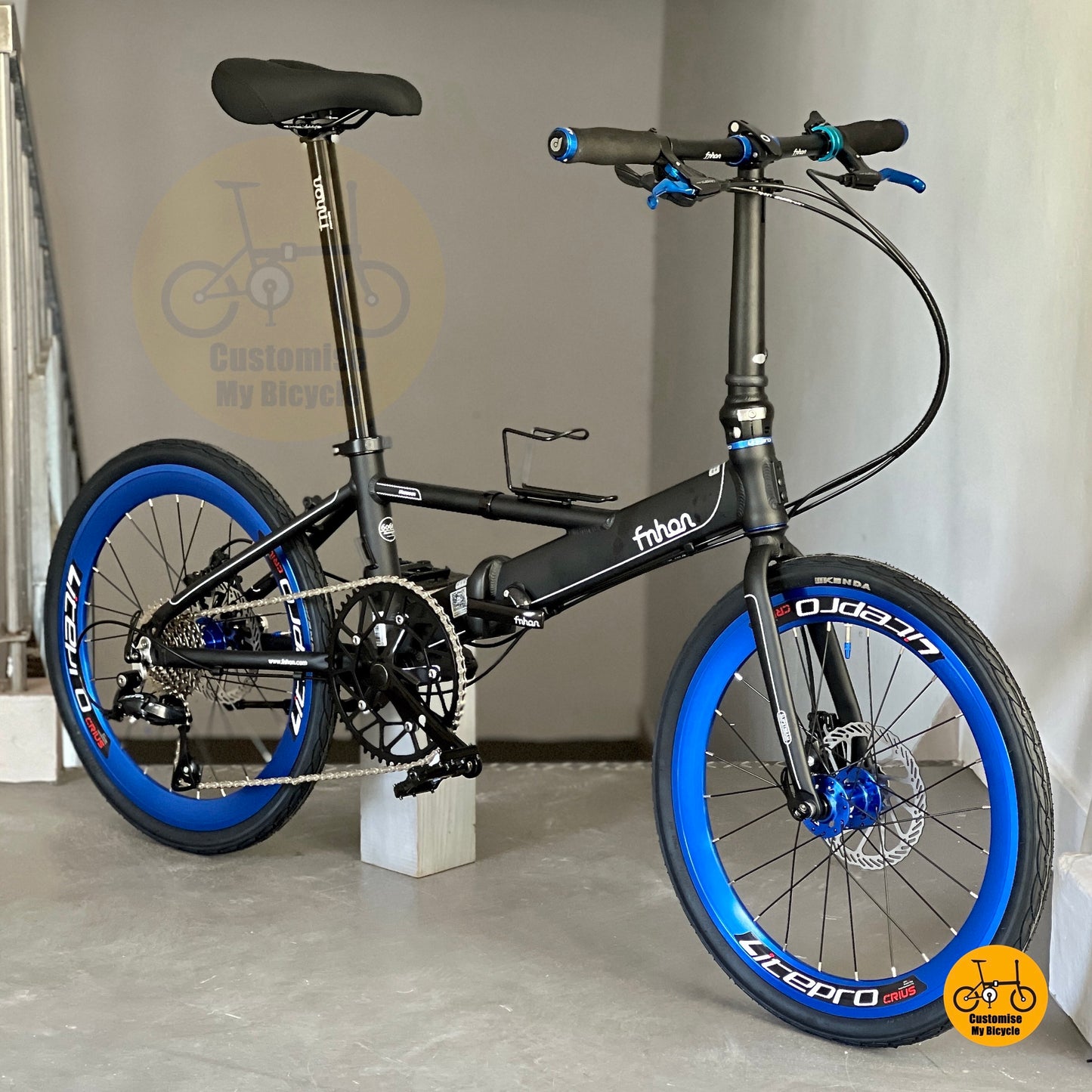 Shop Fnhon Monsoon 22 inch Matte Black Blue Folding Bicycle with Shimano 9 Speed Gears
