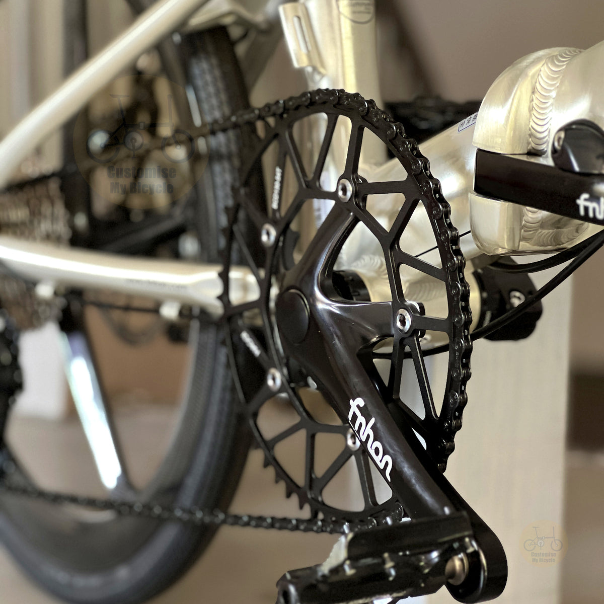 Fnhon Monsoon 22" Titanium Champagne folding bike rear derailleur gearset detail