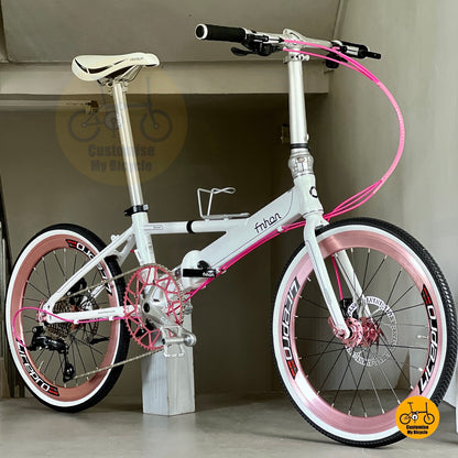 Dreamy White pink-accent foldable bike with high profile wheels and GINEYEA pedals
