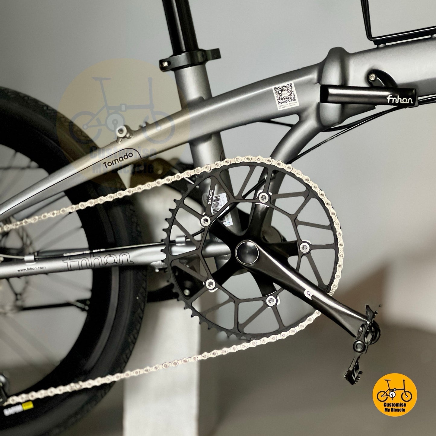 Close up of FNHON LITEPRO Hollowtech crankset and hollow 54t chainring
