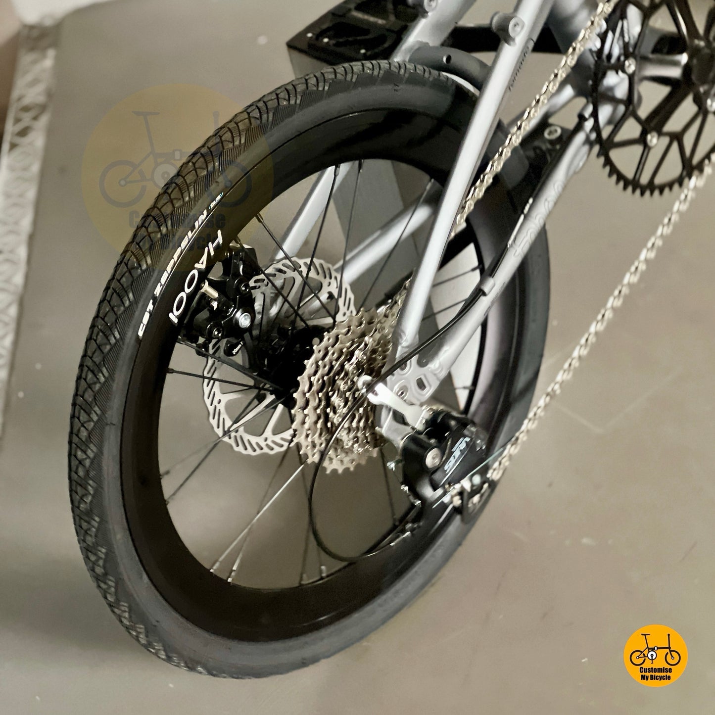 Close up of Shimano 9 gears Sora R3000 rear derailleur and shifting components
