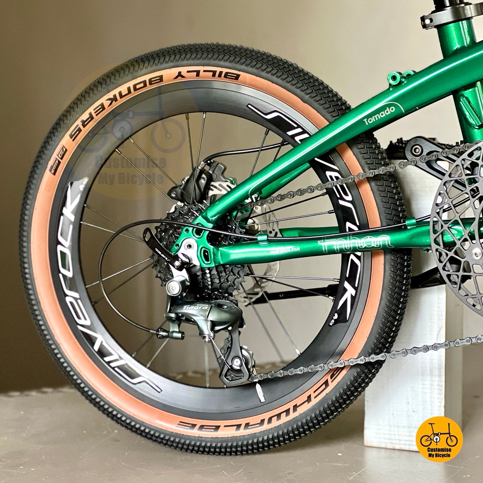 Emerald Green foldable bicycle with Silverock fast rolling wheels