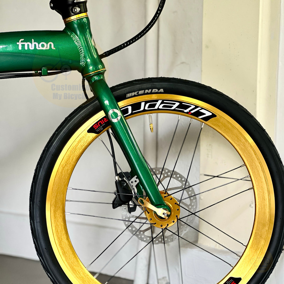Fnhon Tornado folding bike close up of KENDA CST fast rolling tyres