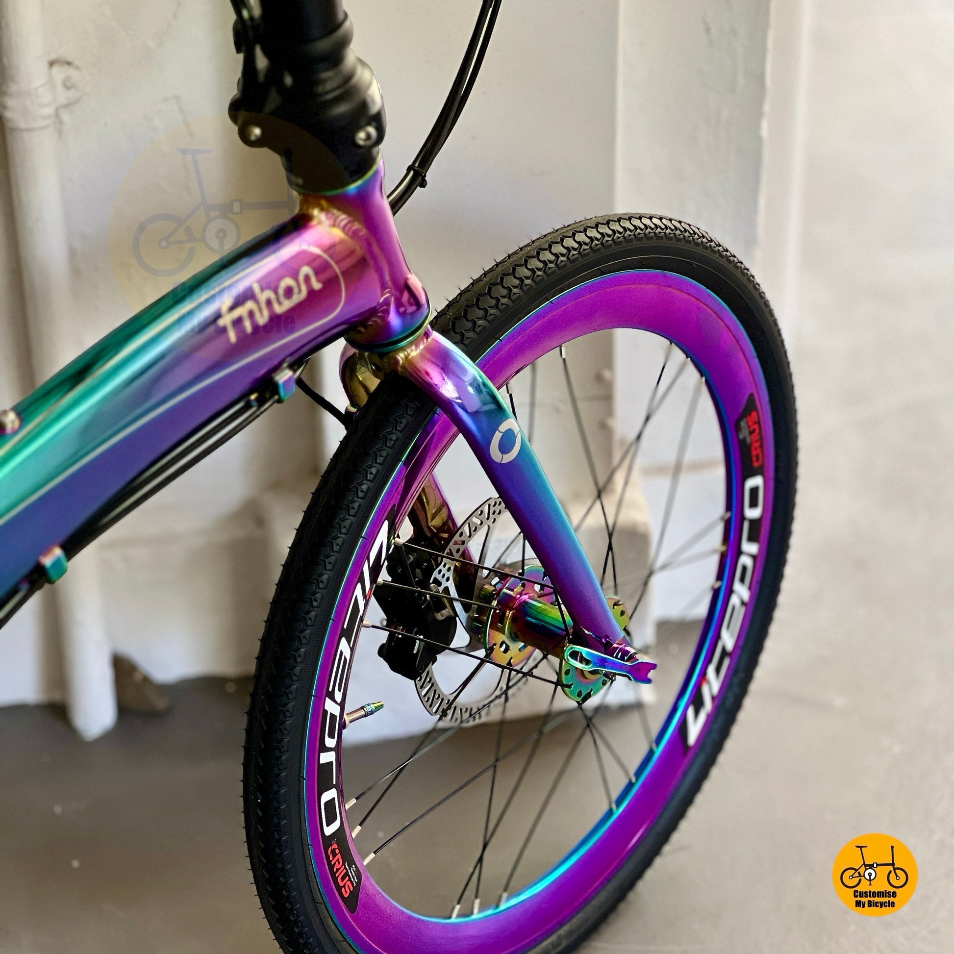 Fnhon Tornado with oil slick colour LITEPRO aero high profile front wheel close up
