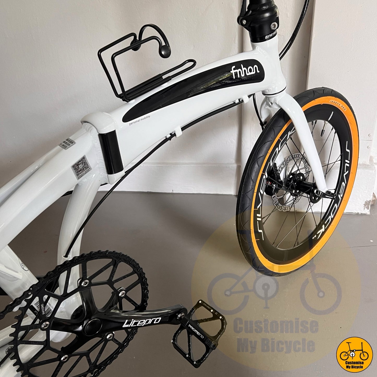 White Fnhon Tornado 20-inch folding bike with Silverock wheelset  
