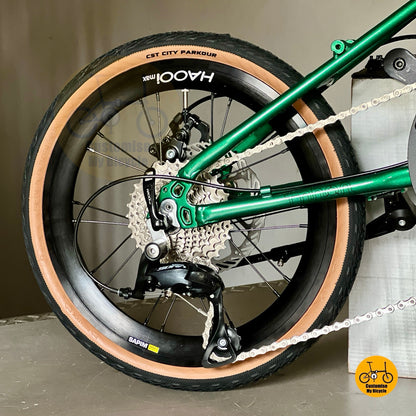 Close up Shimano 9 gears drivetrain folding bike smooth shifting system
