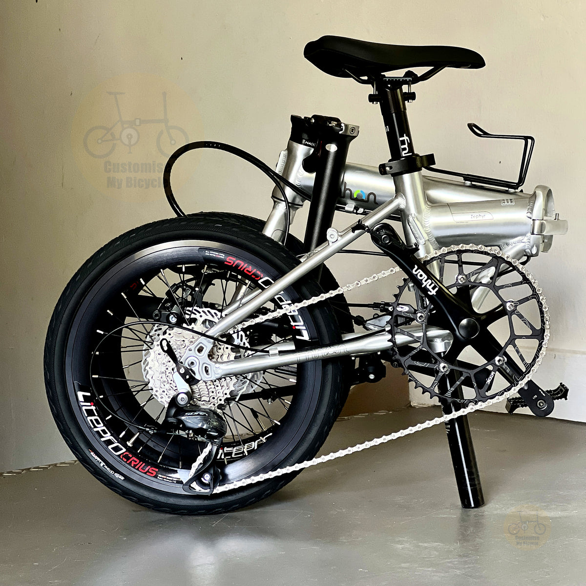 Fnhon Zephyr 16" Platinum Silver folding bike in compact folded configuration