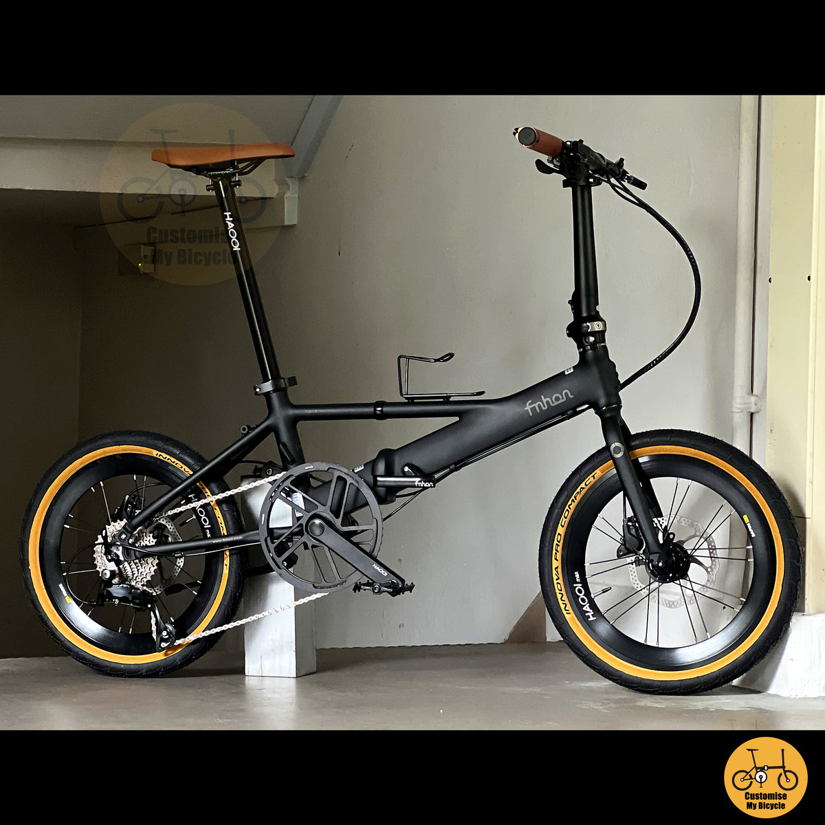 Fnhon Monsoon Mini 18" Matte Black folding bike in compact folded configuration
